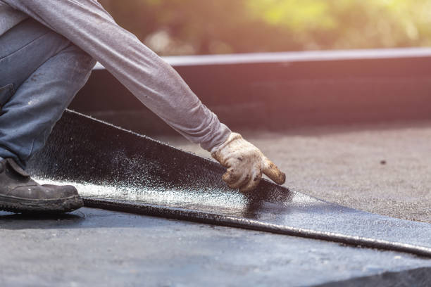 Professional Emergency Waterproofing technician working in Williston Park, NY